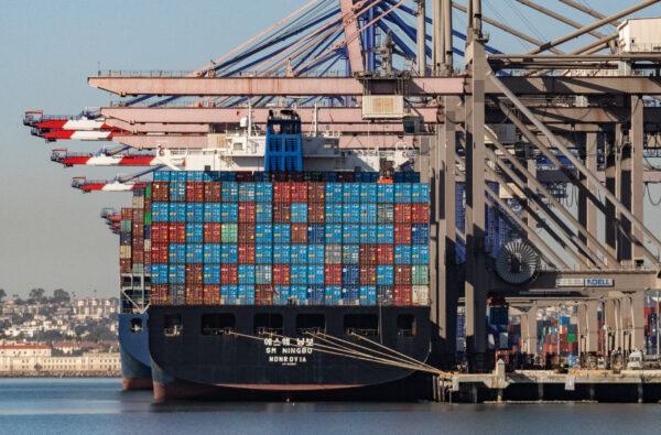 Shipping containers wait to be transferred from the ports of Los Angeles and Long Beach on Oct. 14, 2021. (John Fredricks/The Epoch Times)