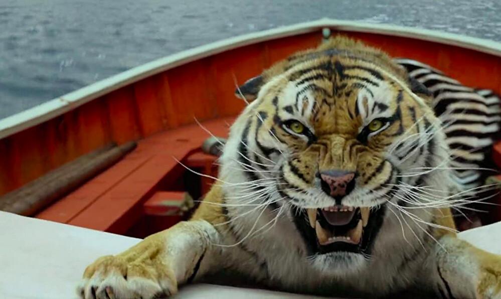 Richard Parker the Bengal Tiger would like to have Pi Patel for lunch, in “Life of Pi.” (Rhythm & Hues/ Twentieth Century Fox Film Corporation)