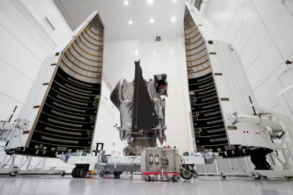NASA's Lucy spacecraft with its housing at the AstroTech facility in Titusville, Fla., on Sept. 29, 2021. (John Raoux/AP Photo)