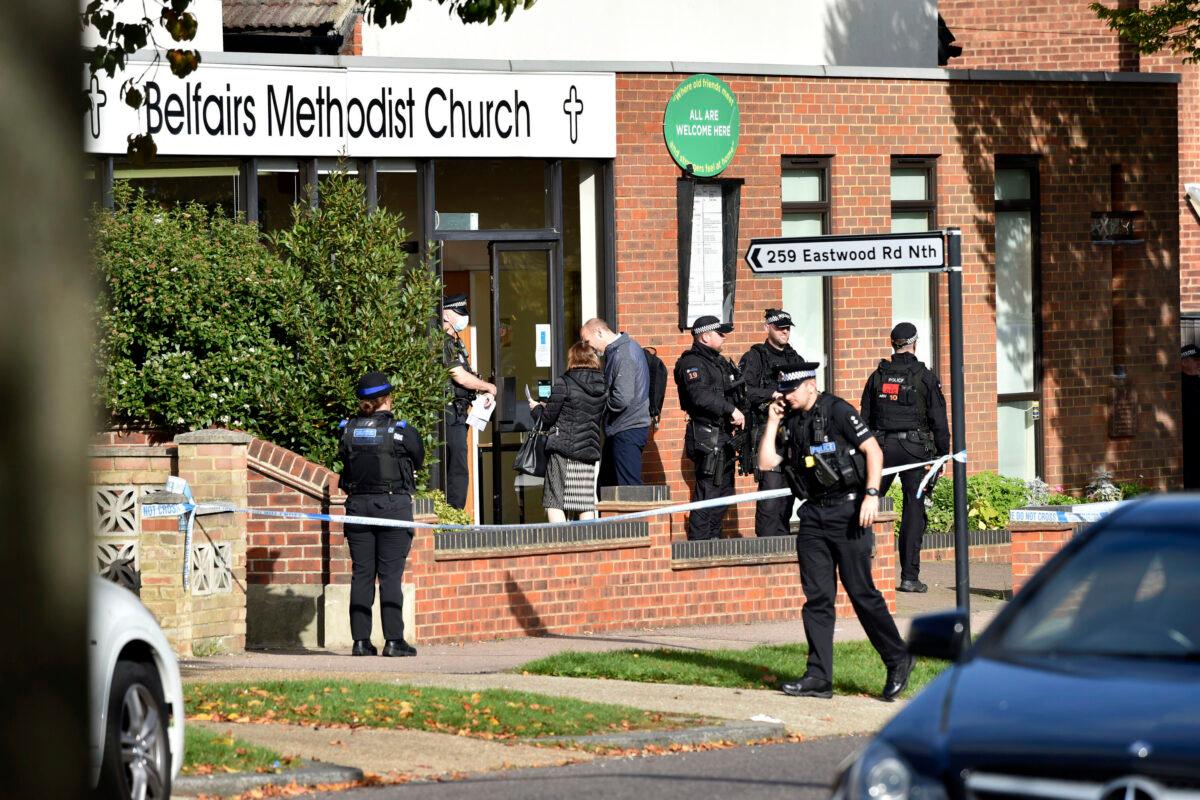 Emergency services at the scene near the Belfairs Methodist Church in Eastwood Road North, where Conservative MP Sir David Amess has reportedly been stabbed several times at a constituency surgery, in Leigh-on-Sea, Essex, England on Oct. 15, 2021. (Nick Ansell/PA via AP)