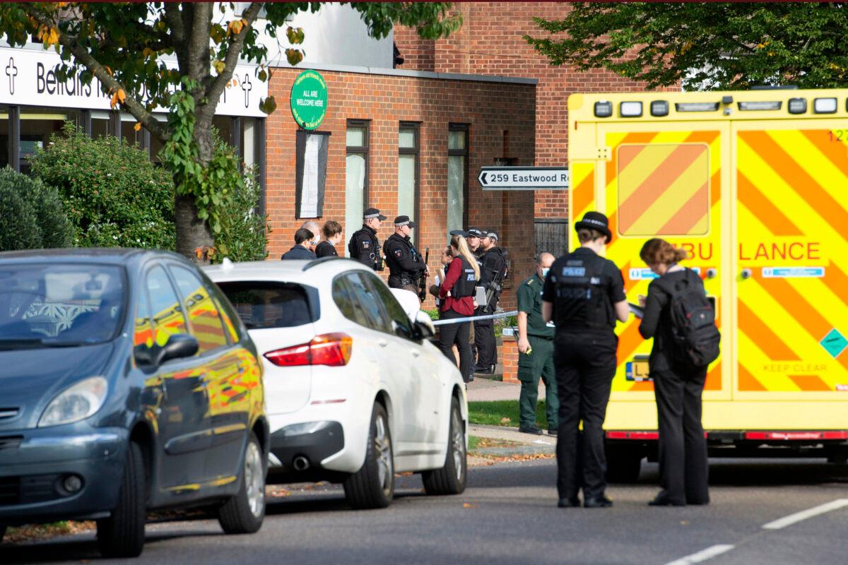 Emergency services at the scene near the Belfairs Methodist Church in Eastwood Road North, where Conservative MP Sir David Amess has reportedly been stabbed several times at a constituency surgery, in Leigh-on-Sea, Essex, England, on Oct. 15, 2021. (Nick Ansell/PA via AP)