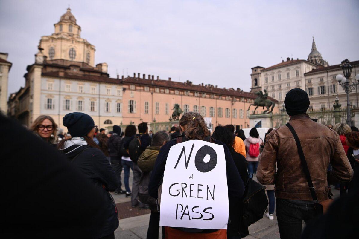 People gather and stage a No Green Pass protest in Turin, Italy, on Oct. 15, 2021. (Marco Alpozzi/LaPresse via AP)
