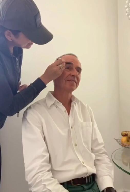 Maria applying her DIY brow product on her father. (Courtesy of <a href="https://www.instagram.com/mariawilkes/">Maria Wilkes</a>)