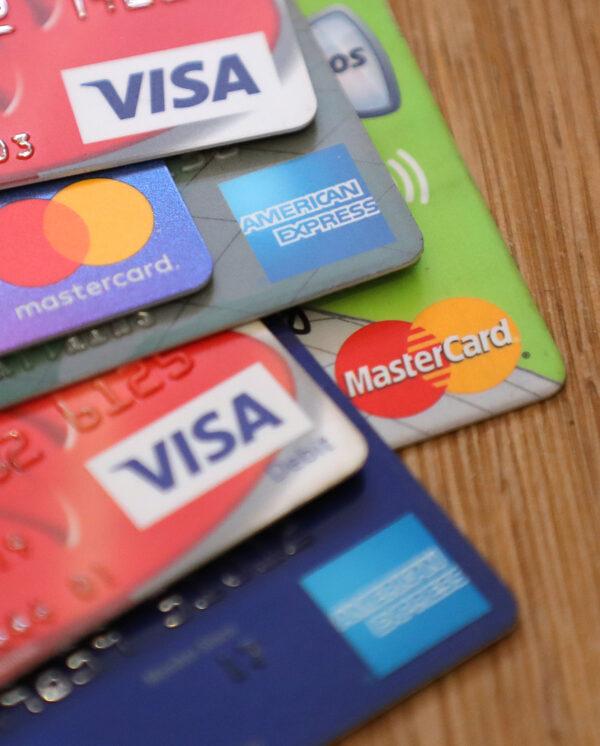 To avoid losing money to online scammers, it's best to use credit cards, rather than debit cards, when shopping online, experts say. (Andrew Matthews/PA)