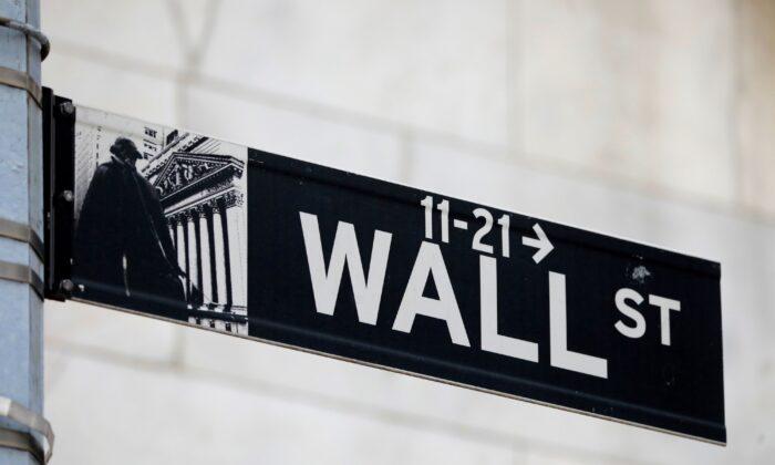 Wall Street Retreats at Open on Earnings Jitters
