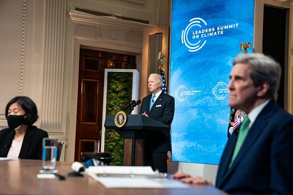 U.S. President Joe Biden (C) delivers remarks as U.S. Trade Representative Katherine Tai and Special Presidential Envoy for Climate and former Secretary of State John Kerry listen during day two of the virtual Leaders Summit on Climate at the East Room of the White House on April 23, 2021. (Anna Moneymaker/Pool/Getty Images)