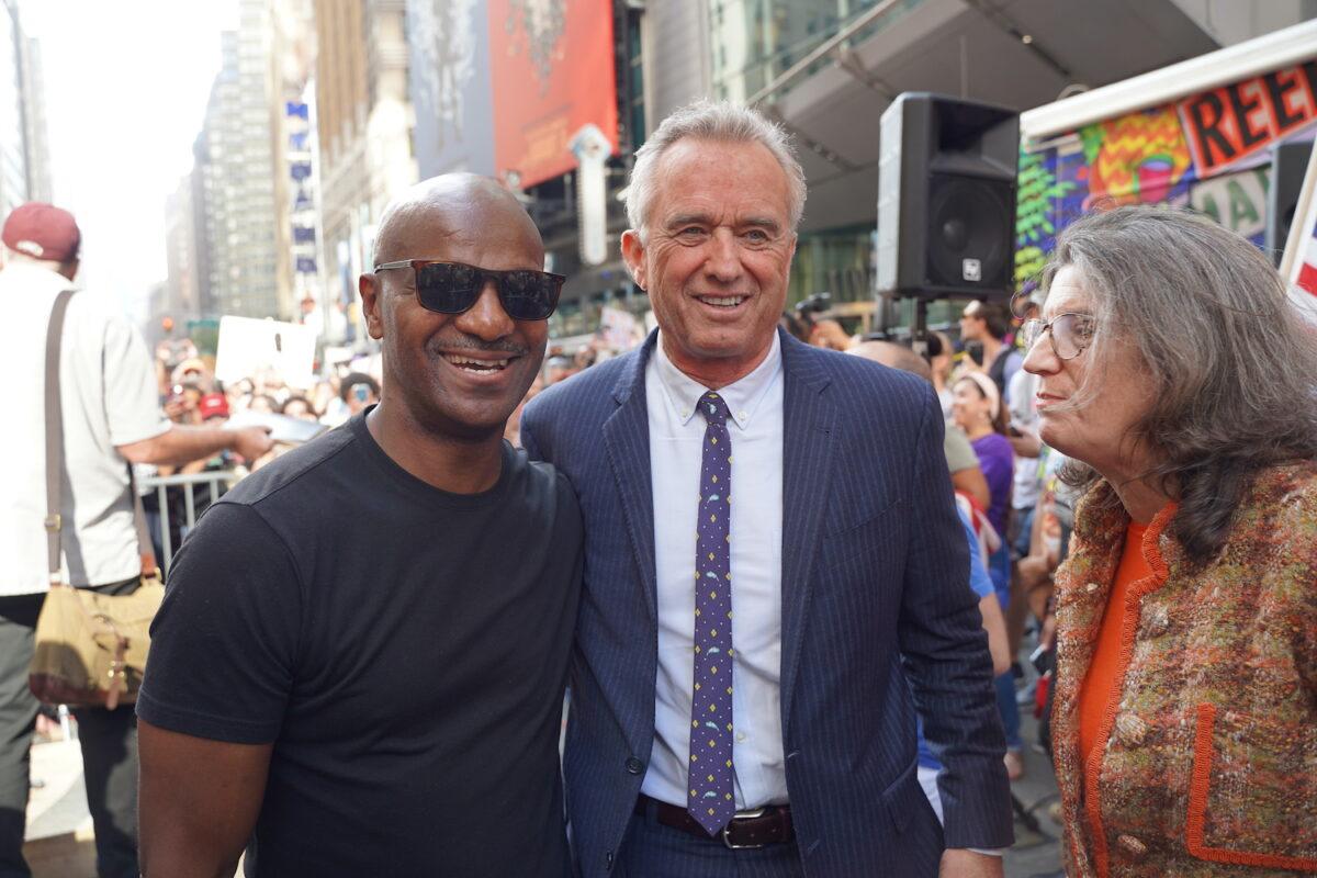 Kevin Jenkins (L) and Robert F. Kennedy Jr. (R) speak at Broadway Rally For Freedom in Manhattan, New York, on Oct. 16, 2021. (Enrico Trigoso/The Epoch Times)