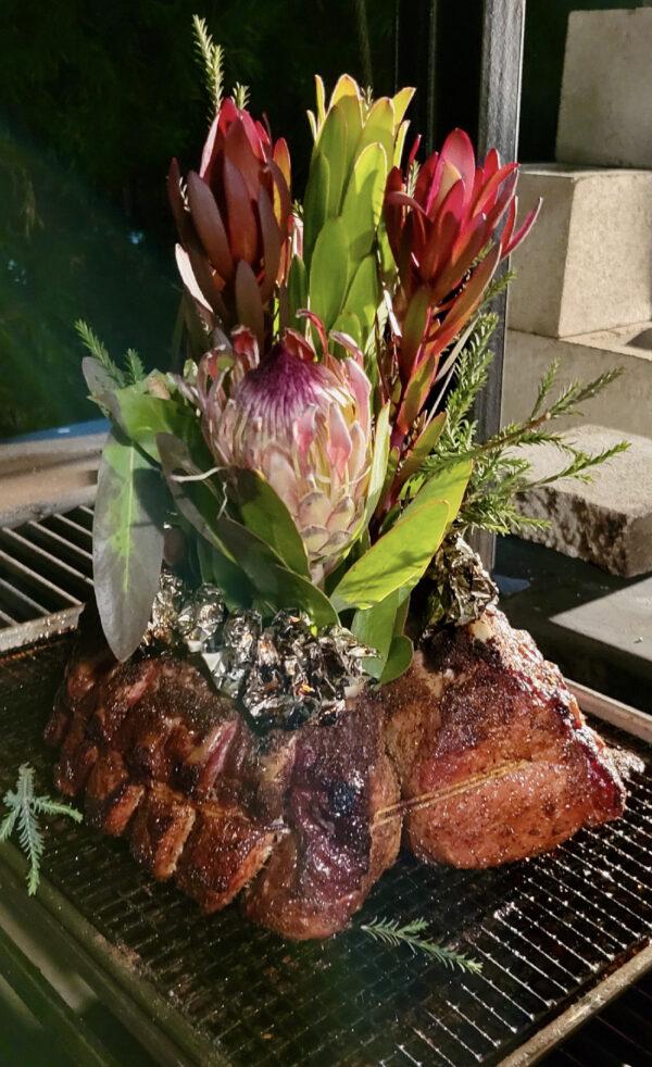 A lavishly decorated crown pork roast is the centerpiece of the "Hemings and Hercules" dinner at Post and Beam in Los Angeles.