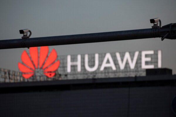 Surveillance cameras are seen in front of a Huawei logo in Belgrade, Serbia, on Aug. 11, 2020. (Reuters/Marko Djurica)
