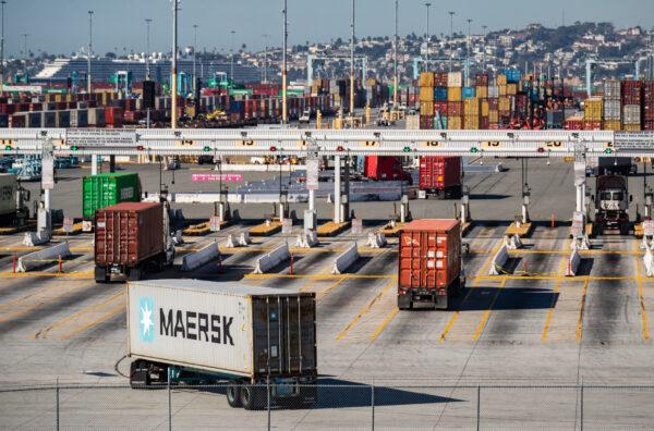 Shipping containers wait to be transferred from the ports of Los Angeles and Long Beach on Oct. 14, 2021. (John Fredricks/The Epoch Times)