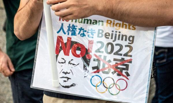 Activists take part in a protest calling for a boycott of the Beijing 2022 Olympic Games over China's human rights record, in Tokyo, on Oct. 2, 2021. (Philip Fong/AFP via Getty Images)
