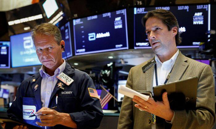 Wall Street Rises as Earnings Whip Up Risk Appetite