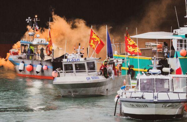 Fishing vessels are seen at sea off the coast of Jersey, on May 6, 2021. (Oliver Pinel via AP)