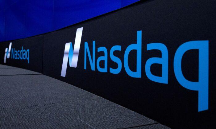 Nasdaq Ends Atop 16,000 Mark for the First Time on Tech Strength