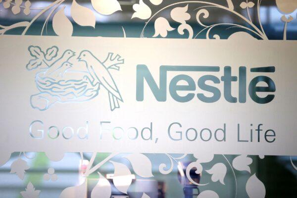 The Nestlé logo is pictured on the door of the supermarket of Nestle headquarters in Vevey, Switzerland, on Feb. 13, 2020. (Pierre Albouy/Reuters)