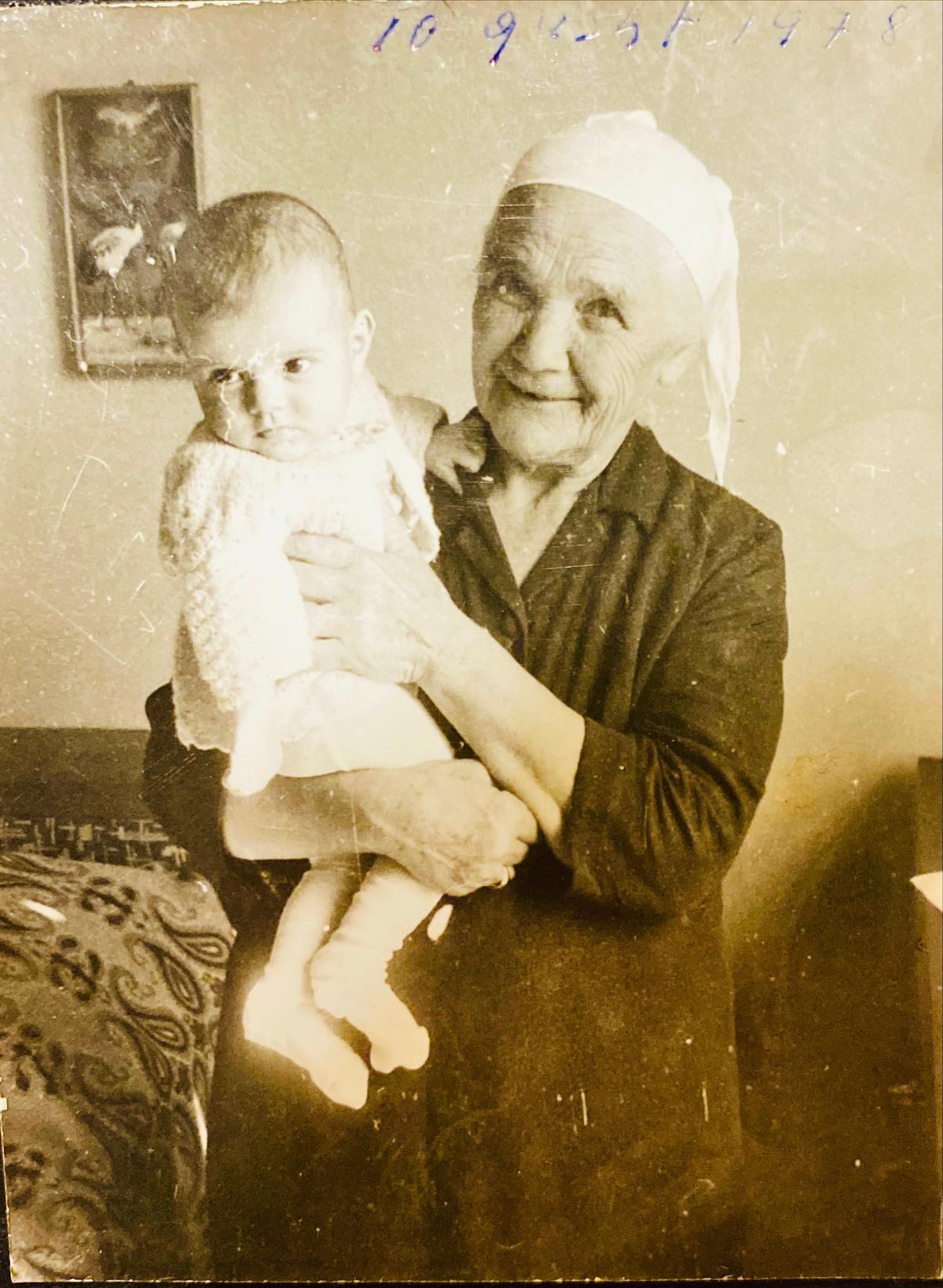 Elida Dakoli as a baby being held by her paternal grandmother, Jaja Dakoli, who was "thrown into the street in the middle of the night" with her children in 1946 after her family home and belongings were sequestered by the Albanian communist regime. (Courtesy of <a href="http://www.elidadakoli.com/">Elida Dakoli</a>)