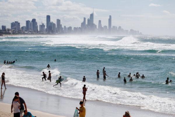 People swim at Burleigh Heads beach in Gold Coast, Australia, on May 16, 2020. (Chris Hyde/Getty Images)