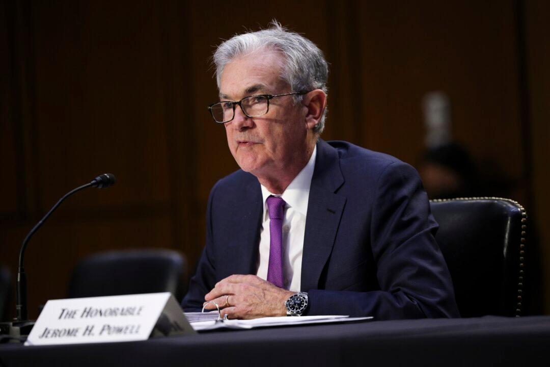 Fed’s Powell Says It’s Time to Taper Bond Purchases, but Not Raise Rates