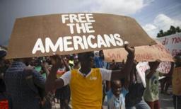 Haiti Gang Leader Threatens Killing 17 US and Canadian Captives
