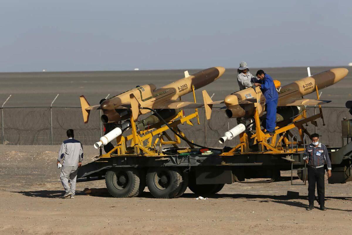 In this picture released by the official website of the Iranian Army, Air Force personnel work on air defense missiles during an exercise, in Iran, on Oct. 21, 2021. (Iranian Army via AP)
