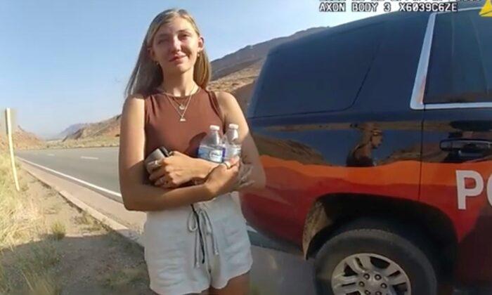 This police camera video provided by The Moab Police Department shows Gabrielle "Gabby" Petito talking to a police officer after police pulled over the van she was traveling in with her boyfriend, The FBI identified human remains found in a Florida nature preserve as those of Brian Laundrie, on Oct. 21, 2021. (The Moab Police Department via AP)