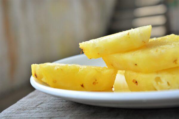Pineapple slices on a plate. (Nvr Endng Anupam via Unsplash)