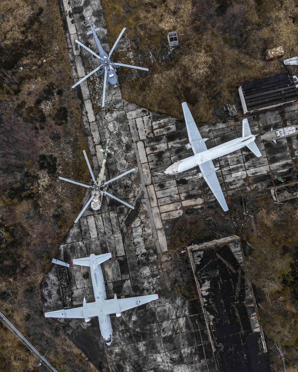 Decommissioned aircraft and helicopters on the territory of a military airfield in the Leningrad oblast. (Courtesy of Caters News)