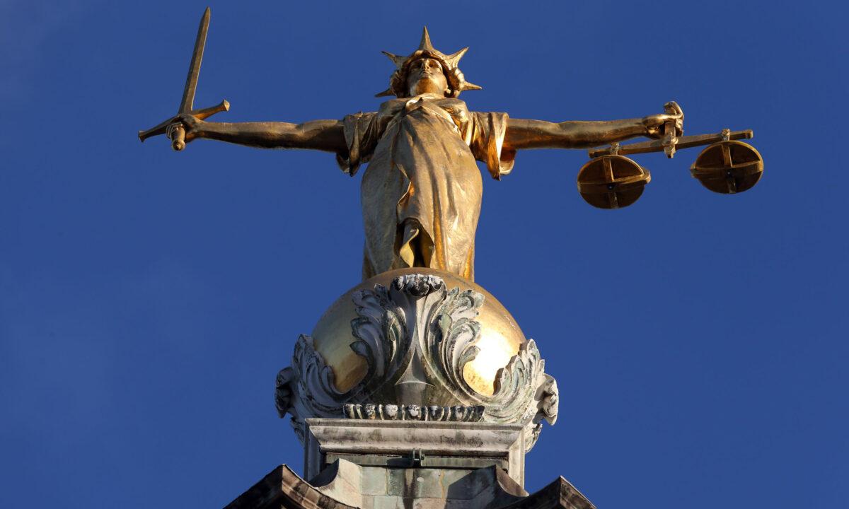 Undated photo showing Lady Justice statue on top of the Central Criminal Court of England and Wales, commonly referred to as the Old Bailey, in central London. (Jonathan Brady/PA)
