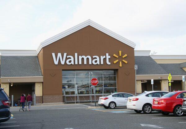 An image of the sign for Walmart as photographed, in East Setauket, N.Y., on March 16, 2020. (Bruce Bennett/Getty Images)