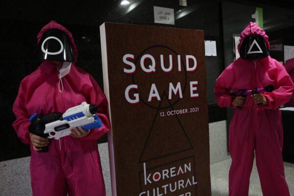 Participants take part in an event where they play the games of Netflix smash hit "Squid Game" at the Korean Cultural Centre in Abu Dhabi, on Oct. 12, 2021. (Giuseppe Cacace/AFP via Getty Images)