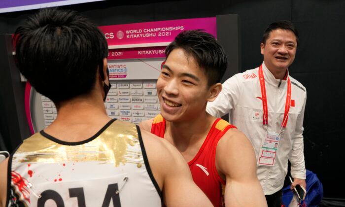 Hu Wins Horizontal Bar, Uchimura Shines at Gymnastics Worlds