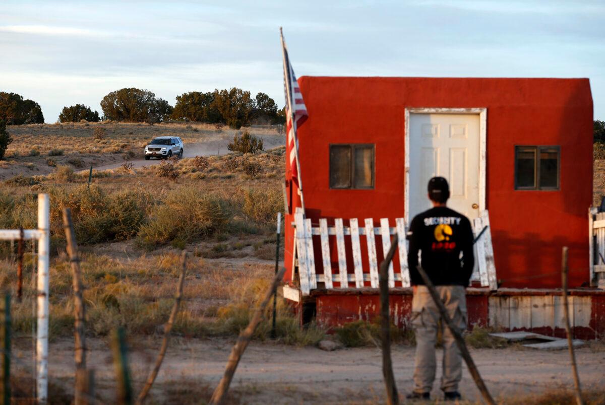A law enforcement vehicle leaves the Bonanza Creek Film Ranch in Santa Fe, N.M. on Oct. 22, 2021. (Andres Leighton/AP Photo)