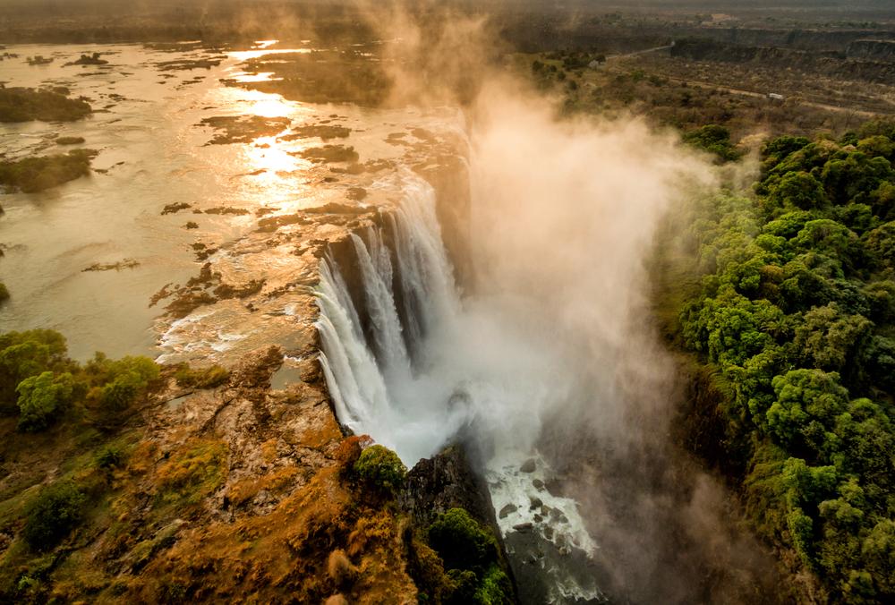 Morning light falls on Victoria Falls. (Kanuman/Shutterstock)