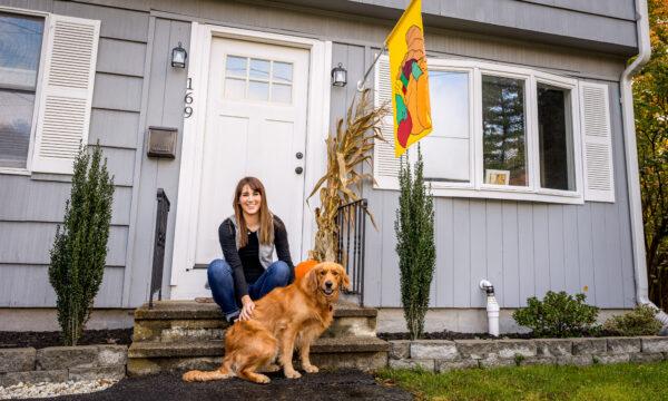 Sam Stanfield in front of her home in Portland, Maine, on Oct. 22, 2021. (Sarah Jane Photography for The Epoch Times