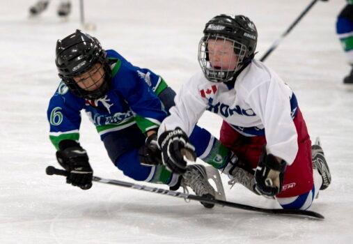 Children play hockey in Orono, Ont., in a file photo. (The Canadian Press/Doug Ives)