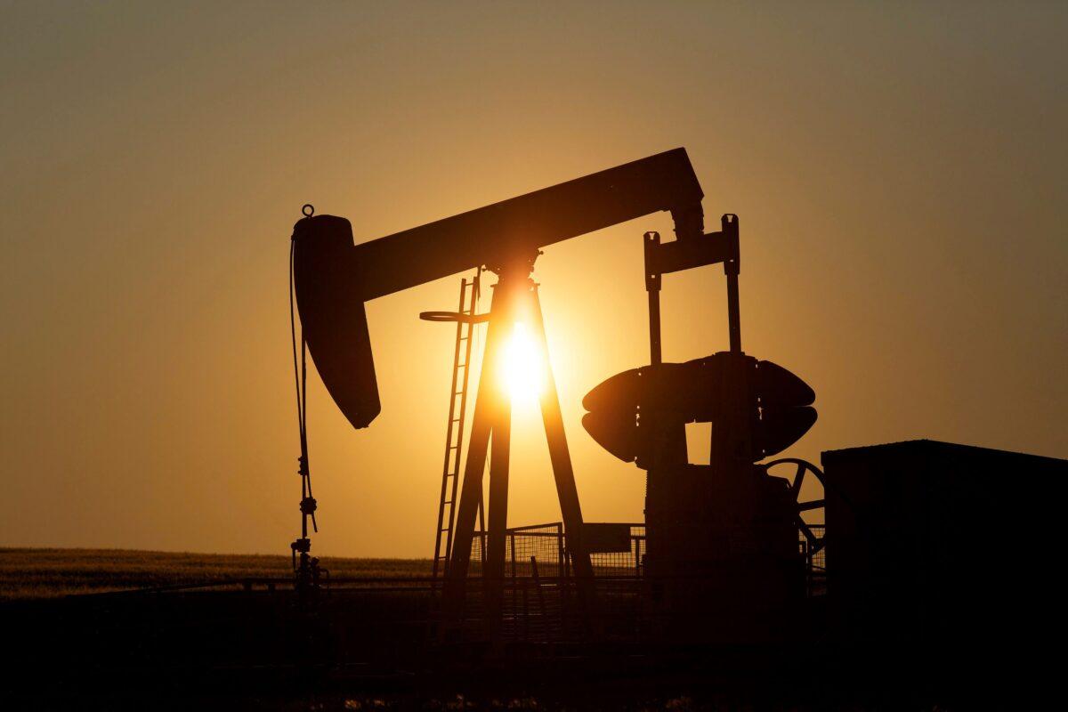 An oil pump jack pumps oil in a field near Calgary, Canada, in a file photo. (Todd Korol/Reuters)