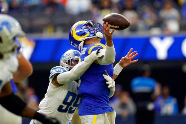 Los Angeles Rams quarterback Matthew Stafford is hit by Detroit Lions linebacker Julian Okwara during the second half of an NFL football game in Inglewood, Calif., on Oct. 24, 2021. (Marcio Jose Sanchez/AP Photo)