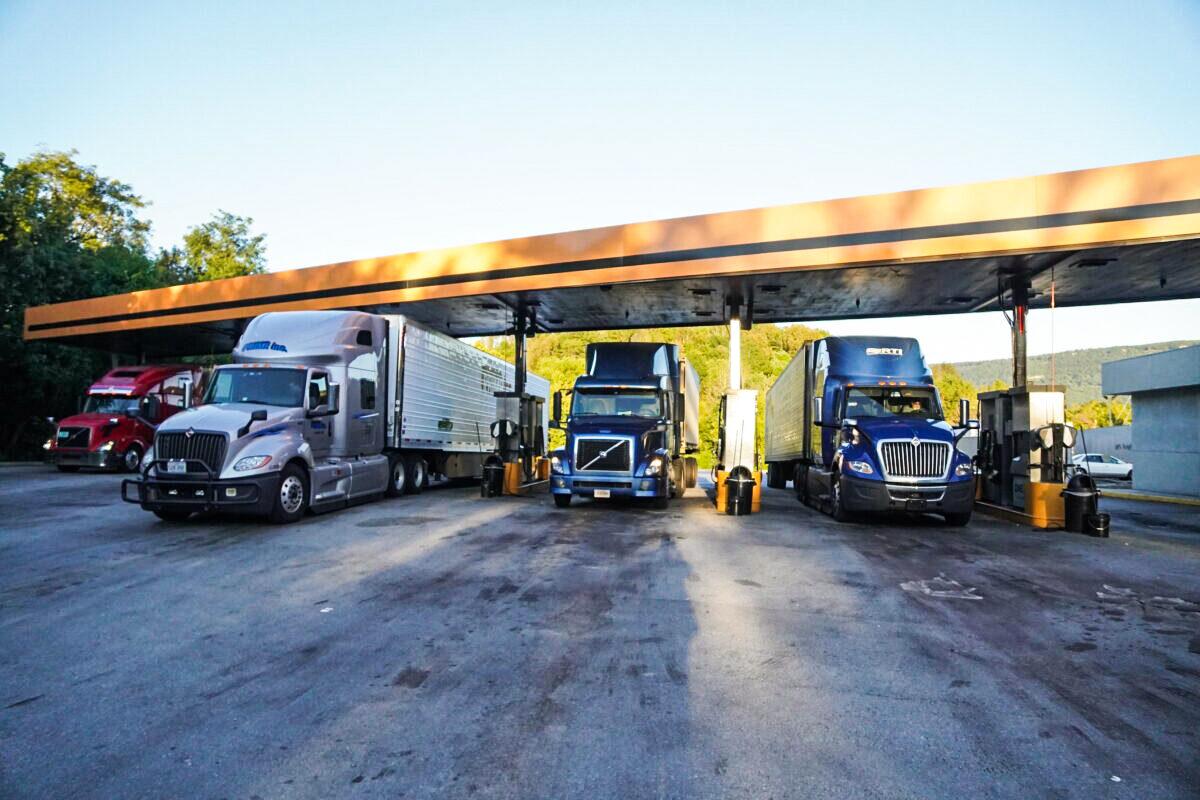 Trucks fill up on gas at the One9 truck stop in Wildwood, Ga., on Oct. 20, 2021. (Jackson Elliott/The Epoch Times)