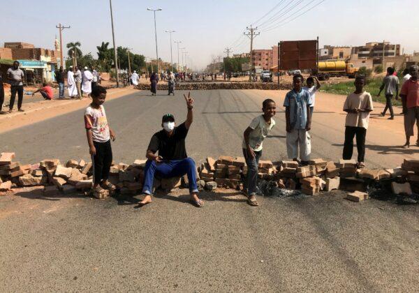 Protesters block a road during what the information ministry calls a military coup in Khartoum, Sudan, on Oct. 25, 2021. (Mohamed Nureldin Abdallah/Reuters)