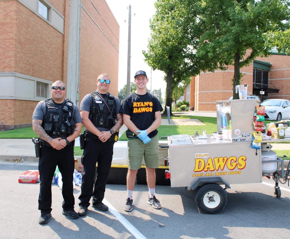 Ryan with the officers from the Bartlesville Police Department at the "Back the Blue" rally in September 2021. (Courtesy of <a href="https://www.facebook.com/Ryans-Dawgs-105867167821533/">Ryan Fouts</a>)