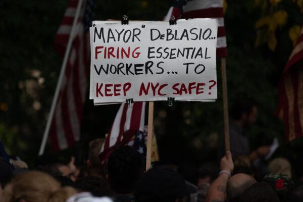 People protest the COVID-19 vaccine mandate for municipal workers in New York City, on Oct. 25, 2021. (David Dee Delgado/Getty Images)