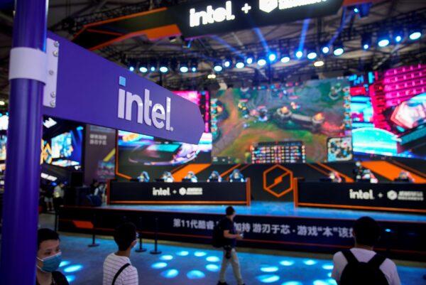 Visitors are seen at the Intel booth during the China Digital Entertainment Expo and Conference, also known as ChinaJoy, in Shanghai on July 30, 2021. (Aly Song/Reuters)