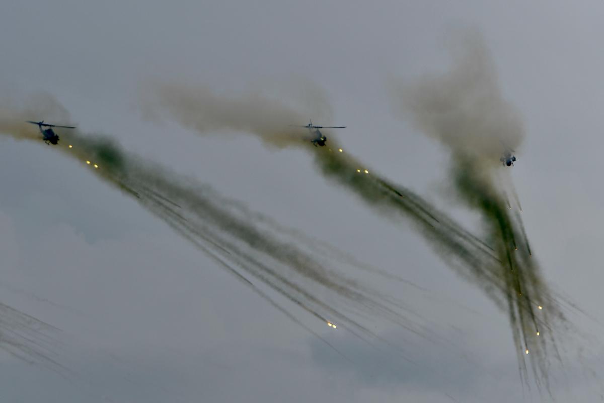 Three U.S.-made AH-1W Super Cobra attack helicopters take part in the annual Han Kuang military drills in Taichung, Taiwan, on July 16, 2020. (Sam Yeh/AFP via Getty Images)