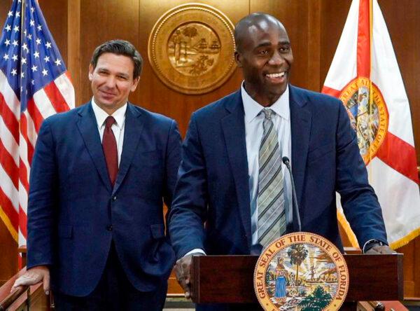 Gov. Ron DeSantis (L) announced Florida's new surgeon general, Dr. Joseph Ladapo, on Sept. 21, 2021. (Courtesy of Governor's Press Office)