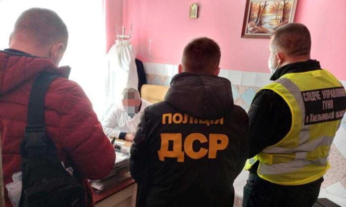 As COVID-19 Toll Surges, Ukraine Cracks Down on Fake Vaccination Certificates
