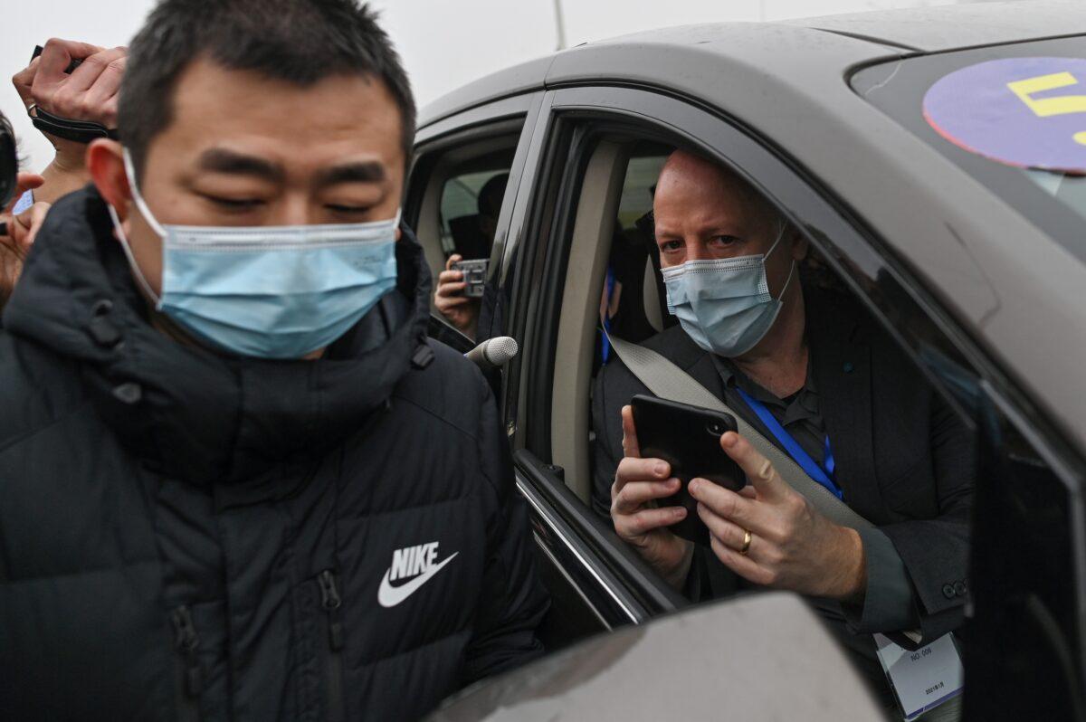Peter Daszak, right, the president of the EcoHealth Alliance, is seen in Wuhan, China, on Feb. 3, 2021. (Hector Retamal/AFP via Getty Images)