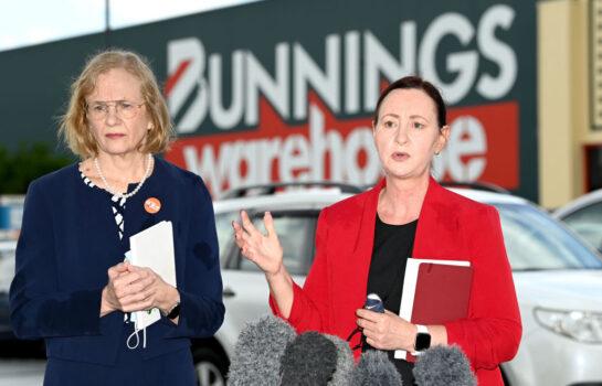 Health Minister Yvette D’Ath (R) and Chief Health Officer Dr. Jeannette Young (L) speak at the Bunnings Store at Stafford in Brisbane, Australia, on Oct. 15, 2021. (Bradley Kanaris/Getty Images)