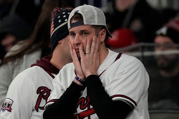 An Atlanta Braves fan watches during the ninth inning in Game 5 of baseball's World Series between the Houston Astros and the Atlanta Braves in Atlanta, on Nov. 1, 2021, (David J. Phillip/AP Photo)
