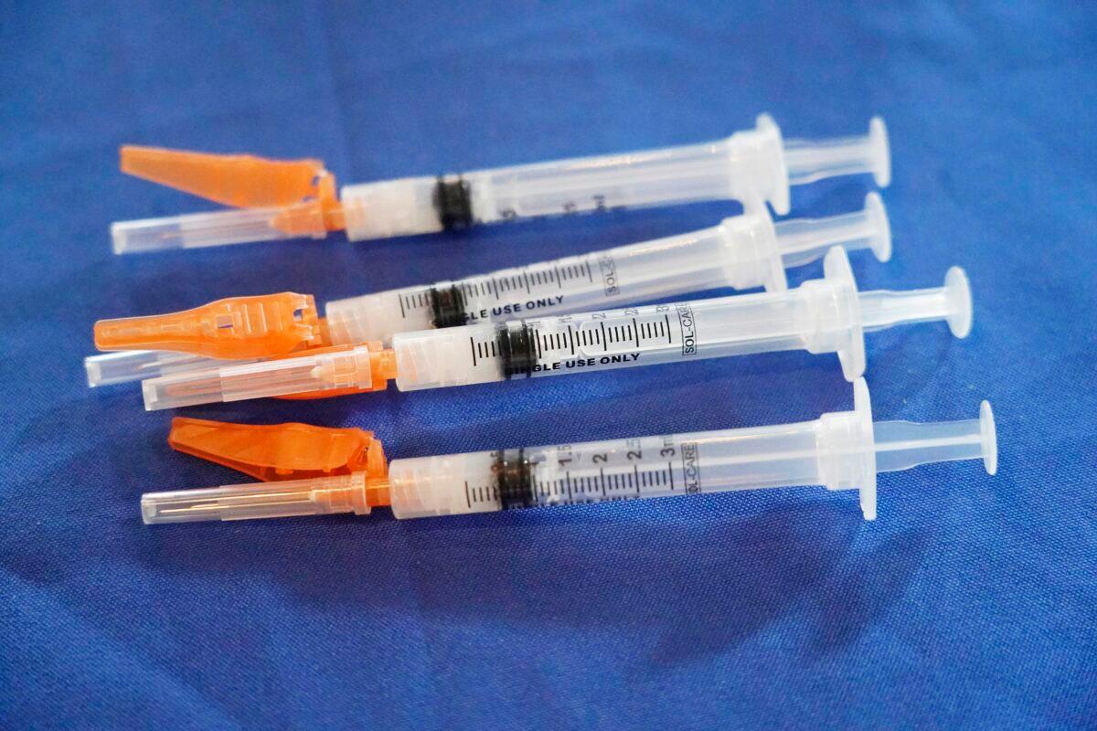 Syringes loaded with the Pfizer COVID-19 vaccine lie ready for use in Jackson, Miss., on Sept. 21, 2021. (Rogelio V. Solis/AP Photo)