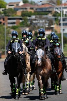 Mounted police monitoring a rally against government-mandated health restrictions and impending Pandemic legislation in Melbourne, Australia, on Nov. 2, 2021. (Supplied)